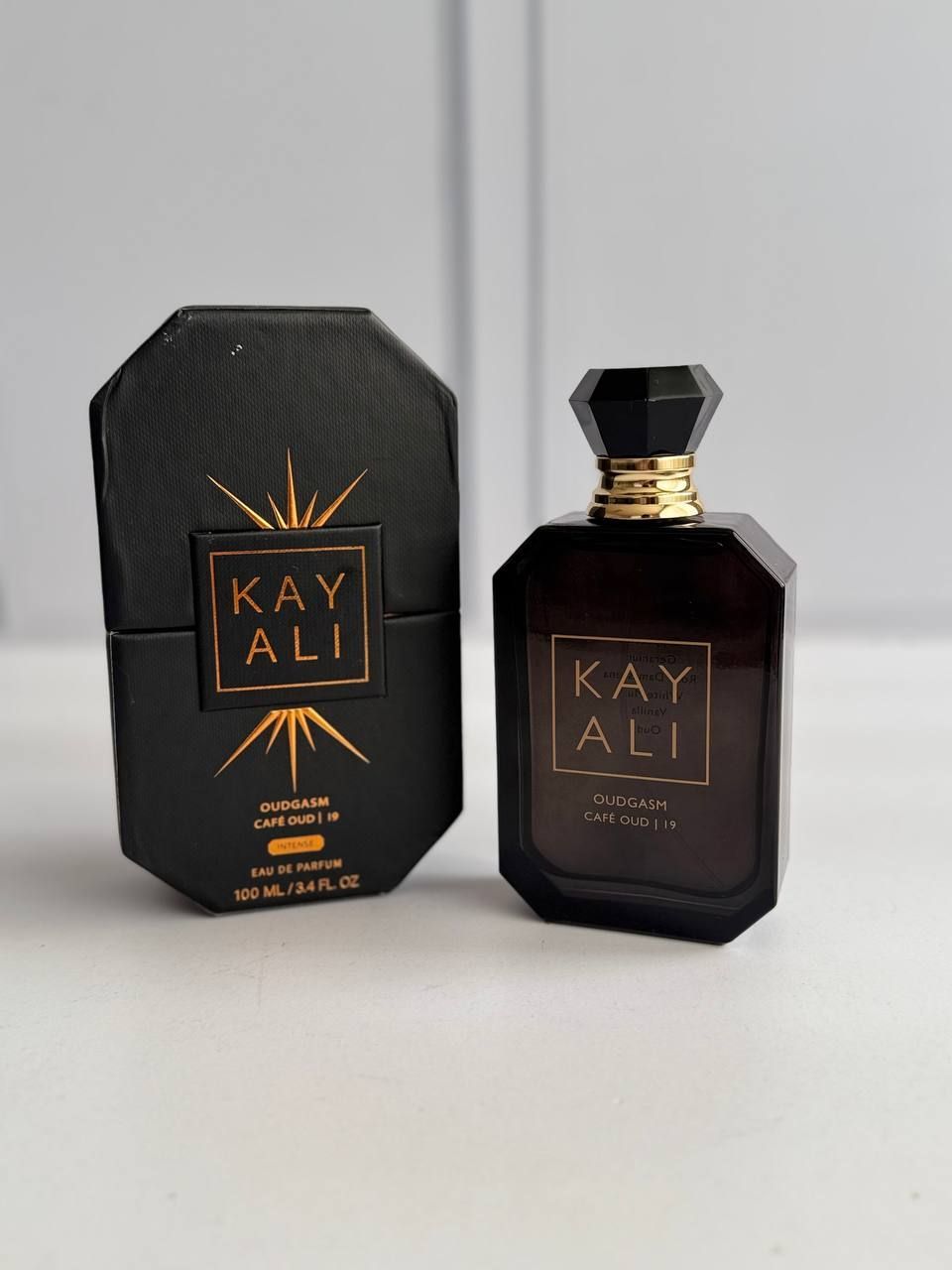 ادکلن اودگاسم کافه عود19 کایالی با رایحه تلخ و دودی 100میل | Kayali Oudgasm Café Oud 19 ادکلن اودگاسم کافه عود19 کایالی با رایحه تلخ و دودی 100میل | Kayali Oudgasm Café Oud 19
